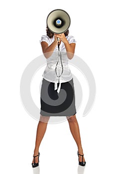 Young businesswoman with megaphone