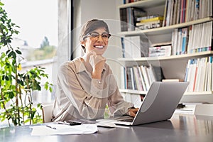 Young businesswoman in office