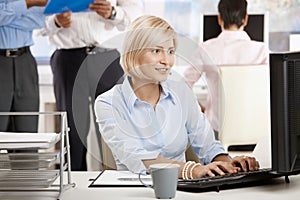 Young businesswoman in office