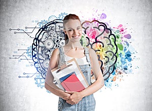 Young businesswoman with papers and brain image