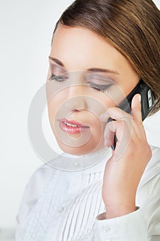 Young businesswoman with phone