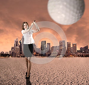 Young businesswoman playing golf