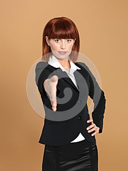 Young businesswoman preparing for hand shake