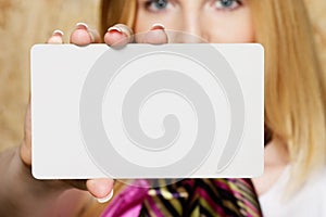 Young businesswoman presenting businesscard