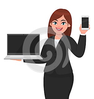 Young businesswoman showing a new brand laptop and latest mobile phone/smartphone. Person holding portable devices.