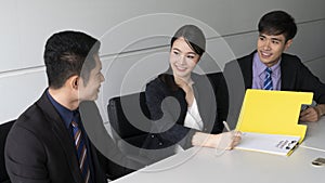 Young businesswoman sign contract document partner business  in meeting conference room