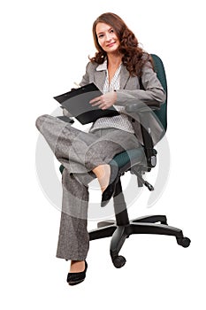 Young businesswoman siiting on office chair