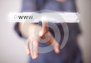 Young businesswoman touching web browser address bar with www si