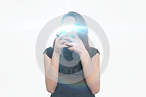 Young businesswoman using smart phone over white background