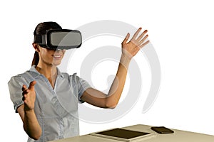 Young businesswoman using a VR headset