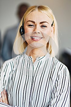 Young businesswoman wearing a headset