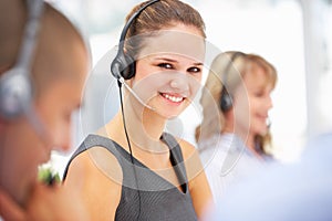 Young businesswoman wearing headset