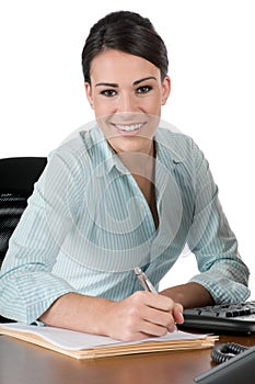 Young businesswoman at work, isolated on white