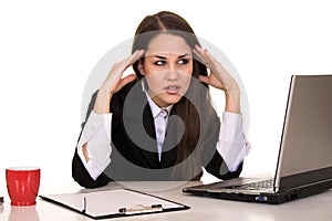 Young businesswoman working at office with computer