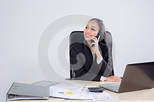 Young businesswoman working in office.