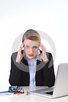 Young businesswoman working in stress at office computer frustrated