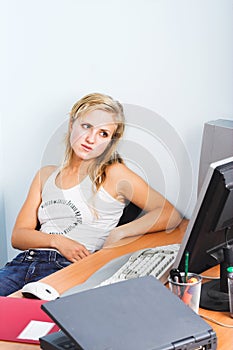 Young businesswoman works on a laptop computer in the modern off