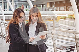 young Businesswomen using tablet computer