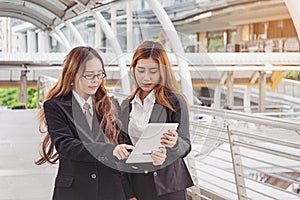 young Businesswomen using tablet computer