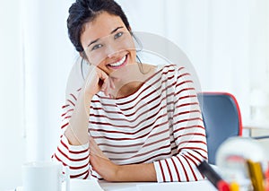 Young businesswomen working in her office.