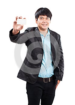 Young businss man standing with happy face holding name card in