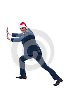 The young busnessman wearing santa hat in christmas concept on white