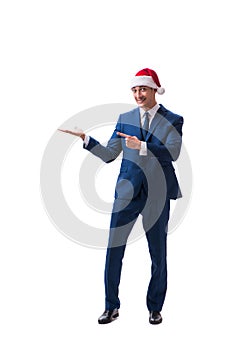 The young busnessman wearing santa hat in christmas concept on white