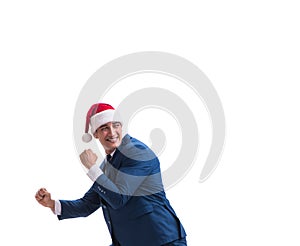 Young busnessman wearing santa hat in christmas concept on white