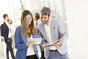 Young bussiness couple in the office photo