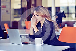 Young busy beautiful latin business woman suffering stress working at office computer