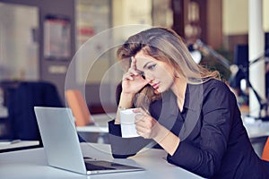 Young busy beautiful latin business woman suffering stress working at office computer