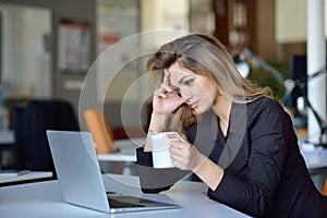 Young busy beautiful latin business woman suffering stress working at office computer