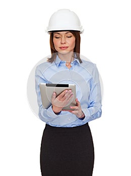 Young calm businesswoman in white helmet