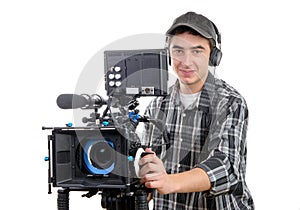 Young cameraman with movie camera