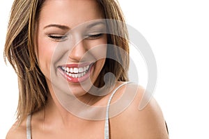 Young candid woman laughing photo