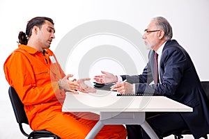 Young captive meeting with advocate in pre-trial detention