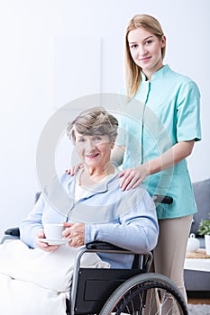 Young caregiver and senior woman