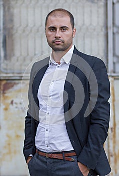 Young casual businessman outdoors