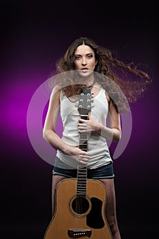 girl holding guitar