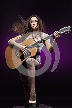 girl holding guitar