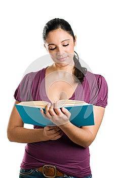 Young casual woman reading a book