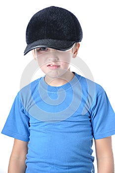 Young caucasian boy wearing baseball cap