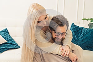 Young Caucasian couple hugging and smiling portrait