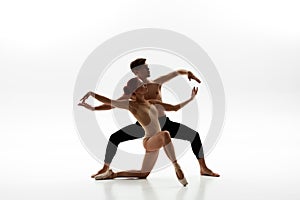 Young caucasian dance couple dancing ballet dance
