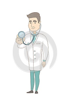 Young caucasian doctor holding a stethoscope.