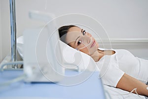 Young Caucasian female patient undergoing oxygen therapy