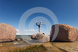 Young caucasian fitness woman practicing yoga