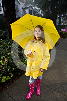 Young caucasian girl with brown hair playing in th