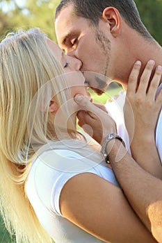 Young Caucasian Lover Kiss In Park