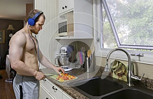 Young caucasian male bodybuilder preparing a healthy meal.